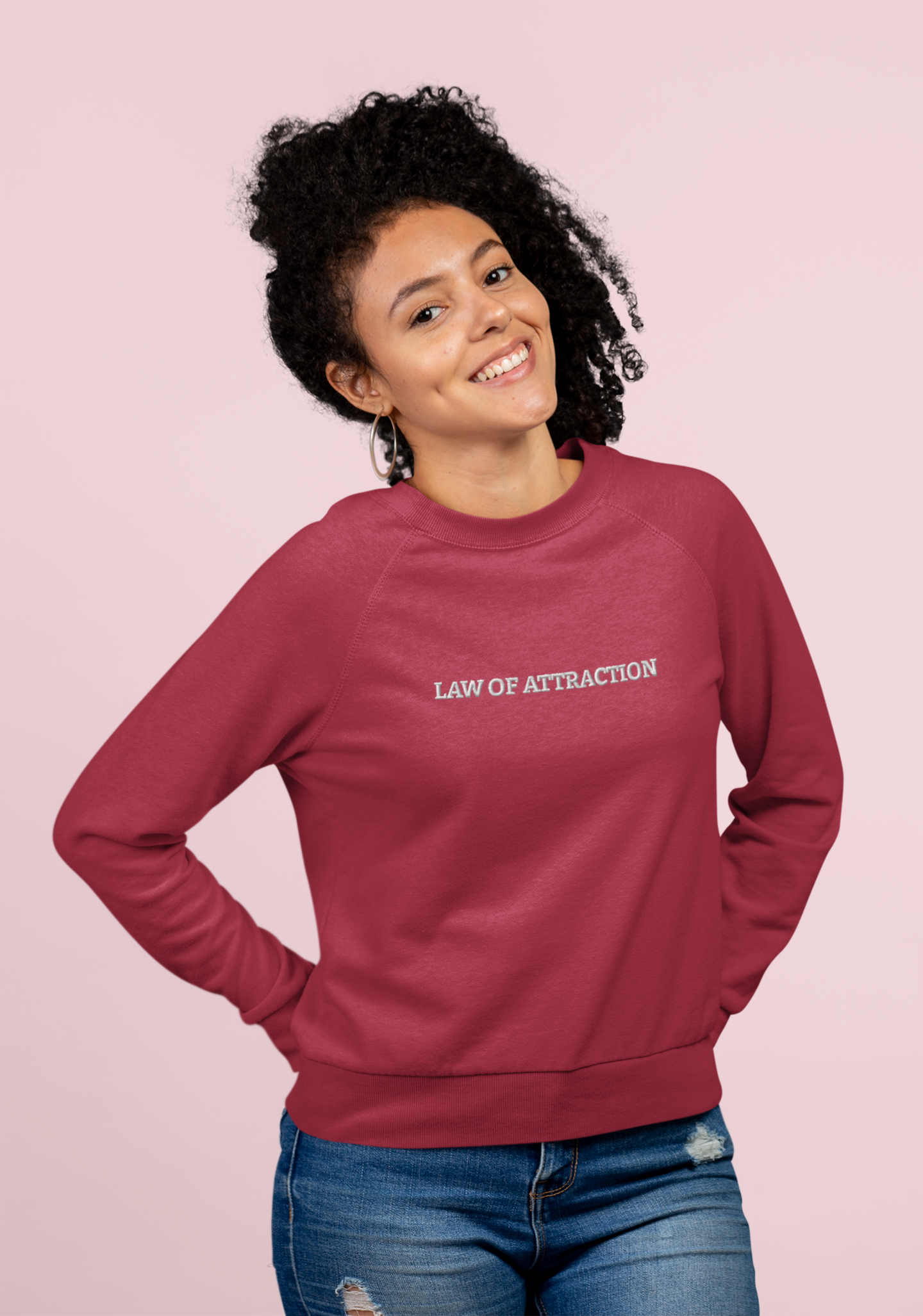 "LAW OF ATTRACTION" Design With White Embroidered Text. Classic Unisex Crewneck Sweatshirt Premium Quality Original Clothing. Wear Your Motivation