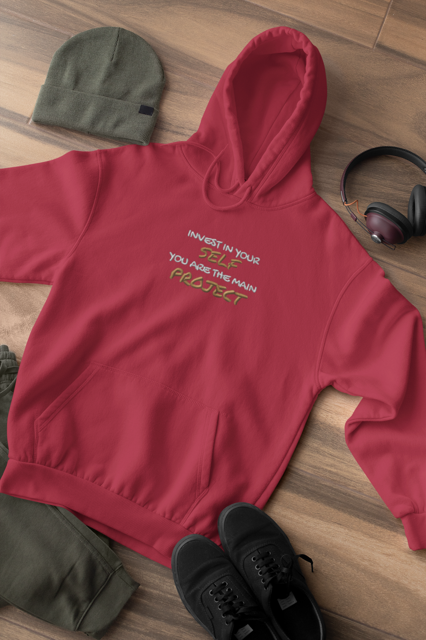 "INVEST IN YOURSELF YOU ARE THE MAIN PROJECT." Design With Gold White Embroidered Text. Classic Unisex Pullover Hoodie Premium Quality Original Clothing. Wear Your Motivation.