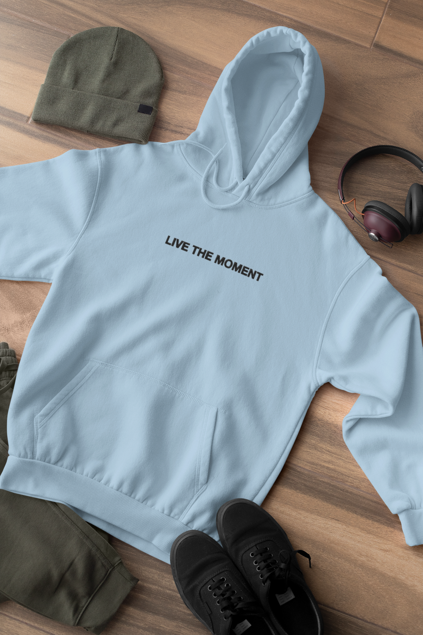 "LIVE THE MOMENT" Design With Black Embroidered Text. Classic Unisex Pullover Hoodie Premium Quality Original Clothing. Wear Your Motivation