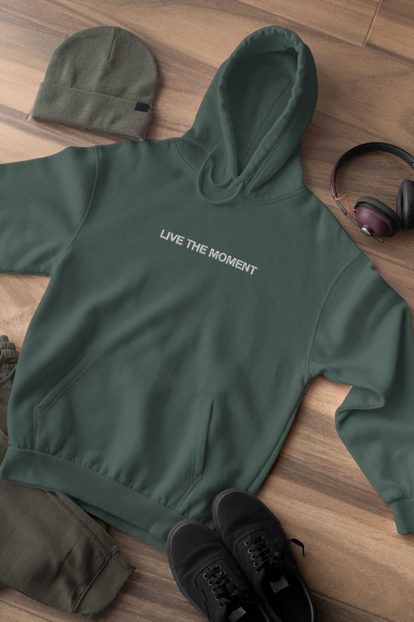 "LIVE THE MOMENT" Design With White Embroidered Text. Classic Unisex Pullover Hoodie Premium Quality Original Clothing. Wear Your Motivation