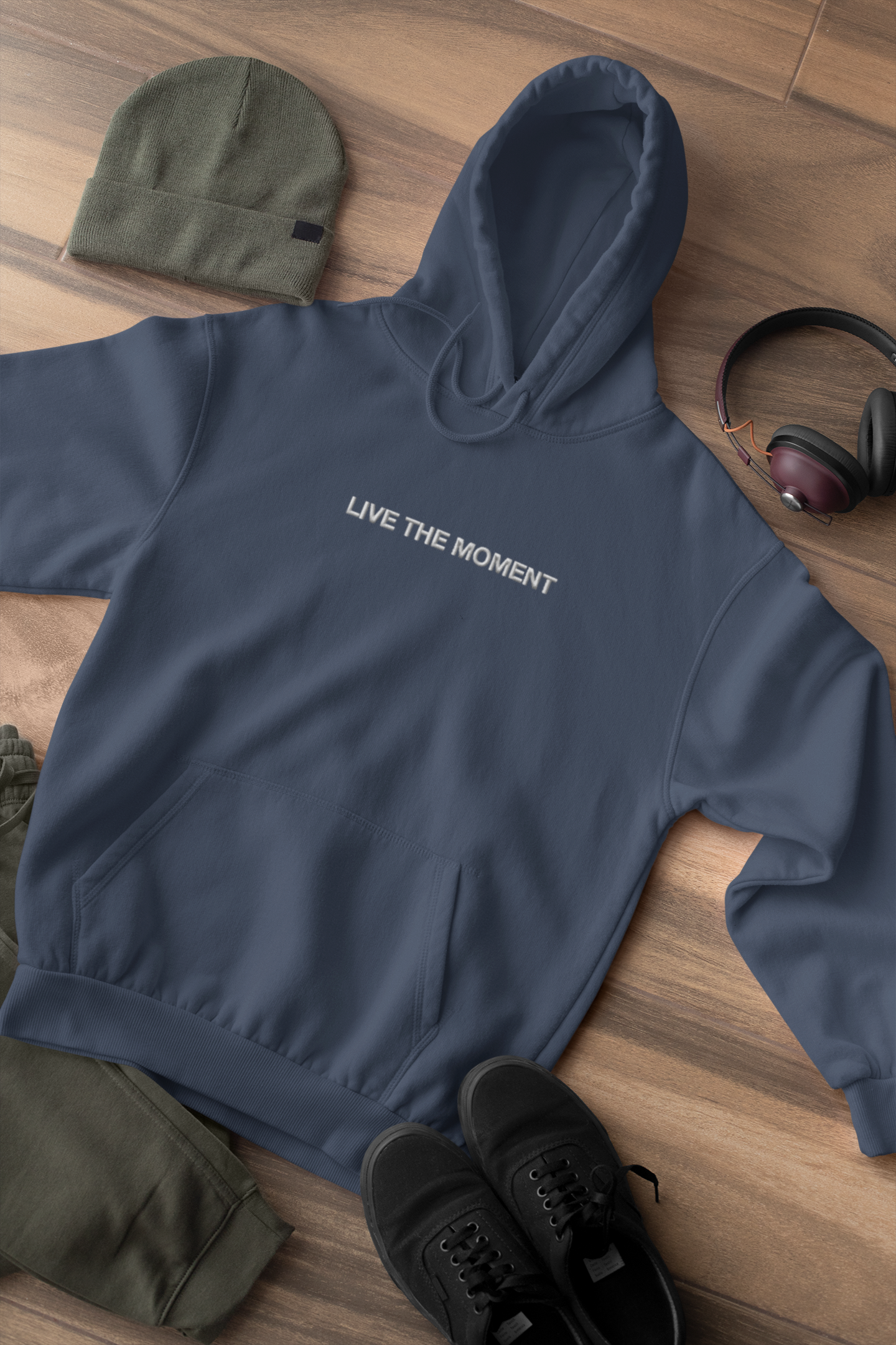 "LIVE THE MOMENT" Design With White Embroidered Text. Classic Unisex Pullover Hoodie Premium Quality Original Clothing. Wear Your Motivation