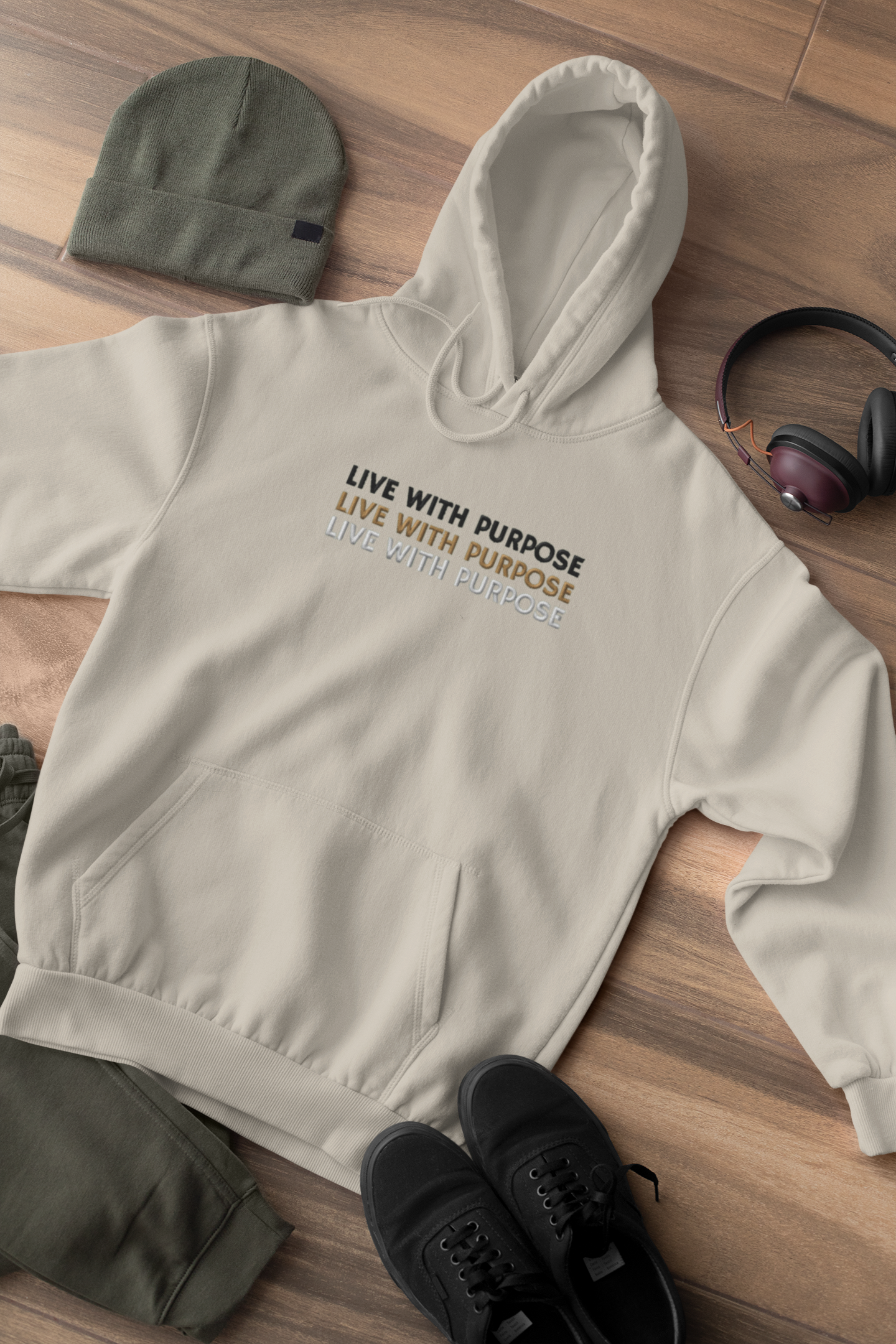 "LIVE WITH PURPOSE" Design With Gold Black White Embroidered Text. Classic Unisex Pullover Hoodie Premium Quality Original Clothing. Wear Your Motivation