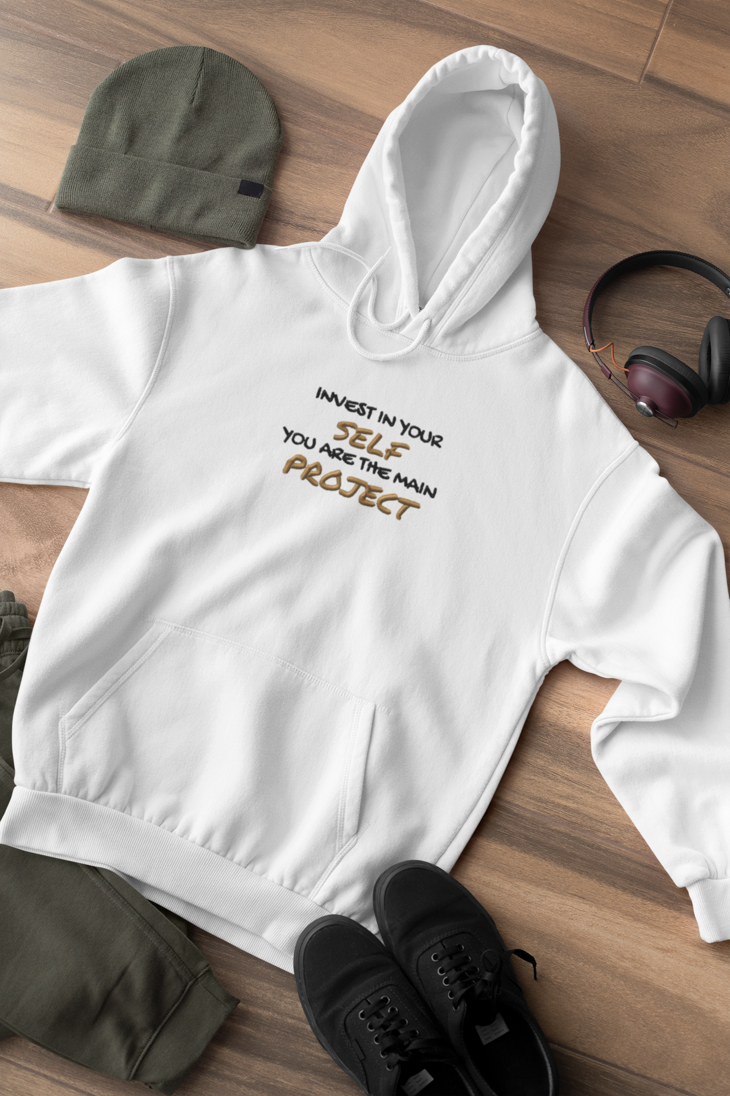 "INVEST IN YOURSELF YOU ARE THE MAIN PROJECT." Design With Gold Black Embroidered Text. Classic Unisex Pullover Hoodie Premium Quality Original Clothing. Wear Your Motivation