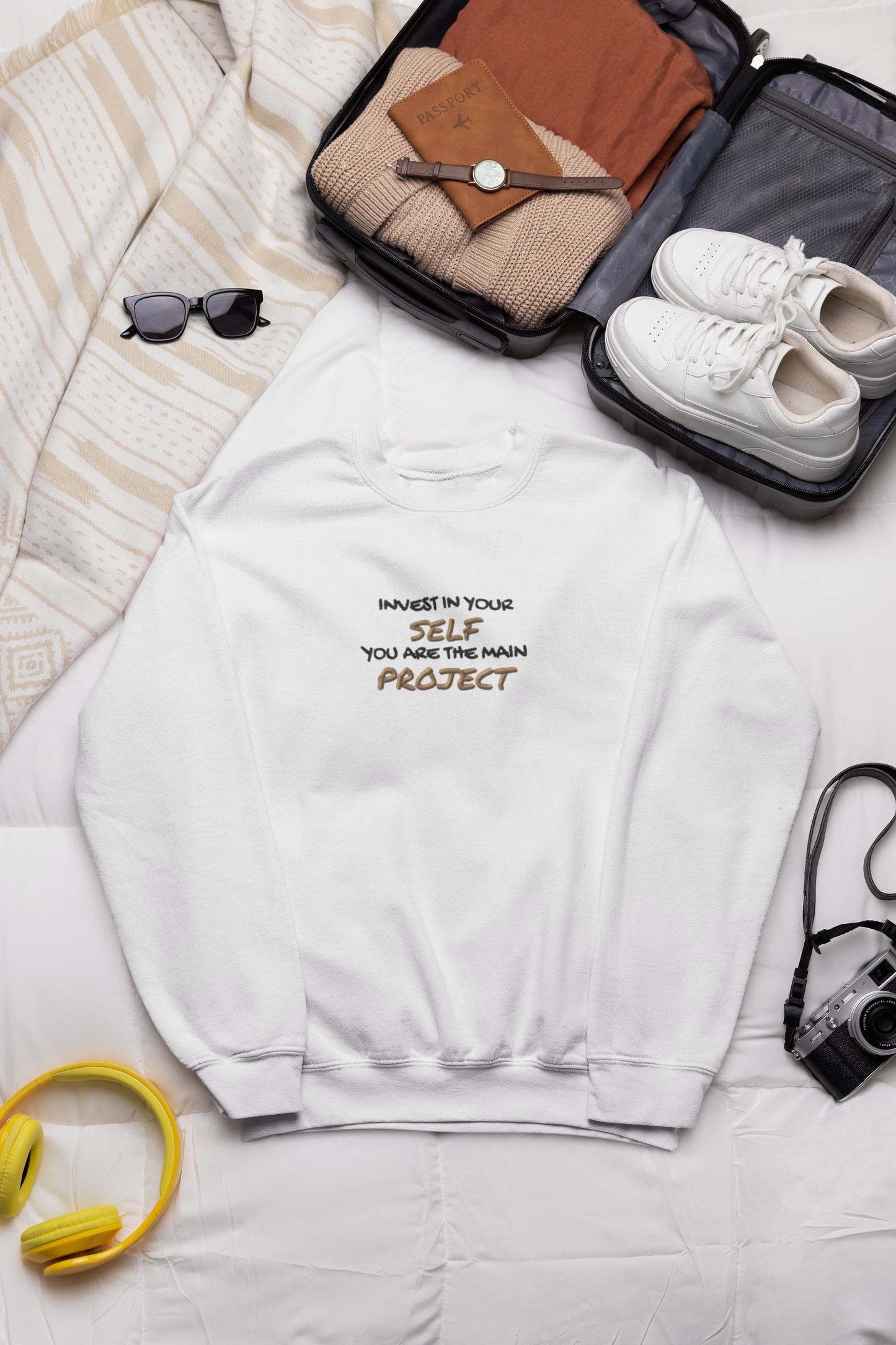 "INVEST IN YOURSELF YOU ARE THE MAIN PROJECT." Design With Gold Black Embroidered Text. Classic Unisex Crewneck Sweatshirt Premium Quality Original Clothing. Wear Your Motivation.