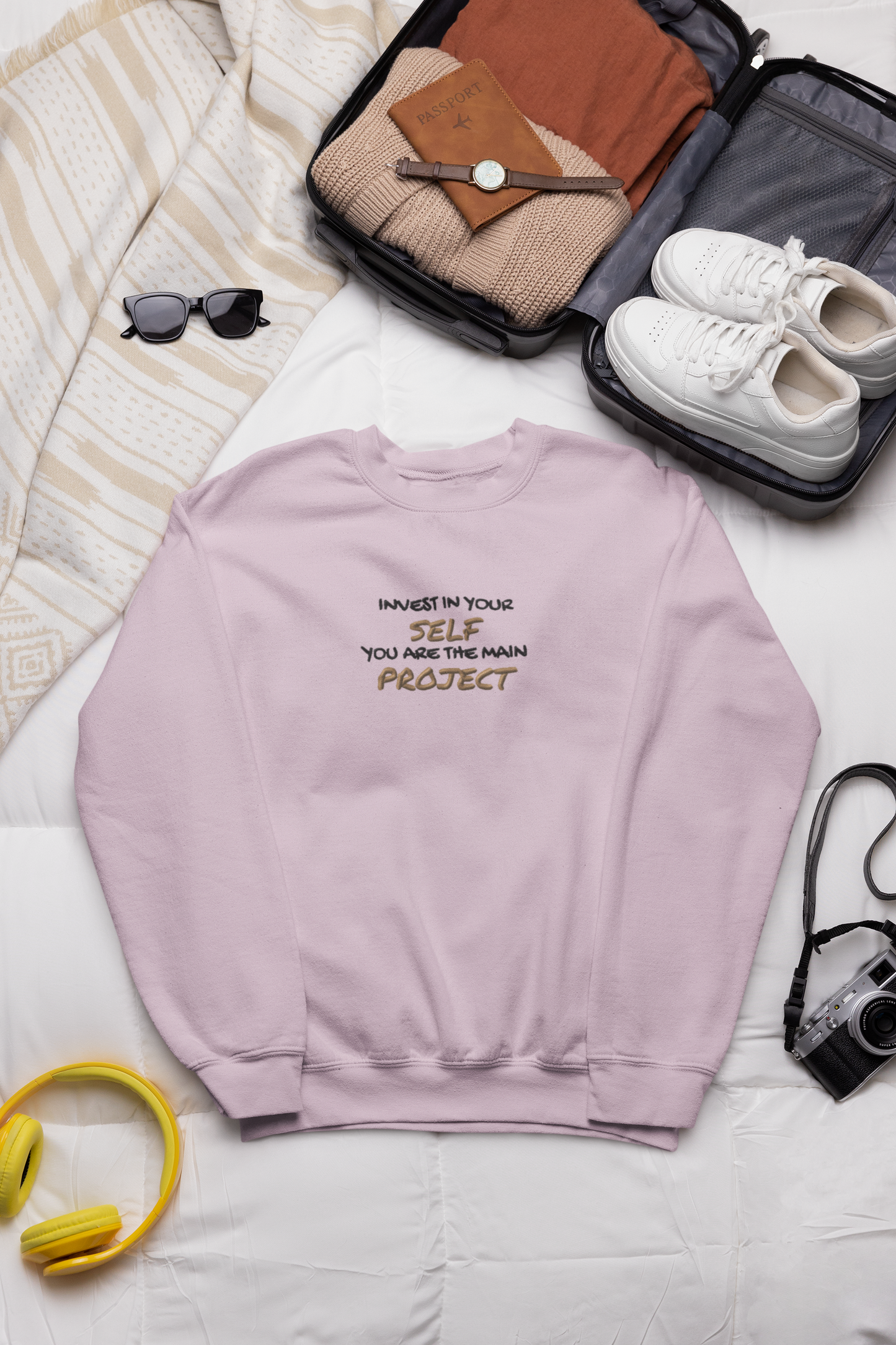 "INVEST IN YOURSELF YOU ARE THE MAIN PROJECT." Design With Gold Black Embroidered Text. Classic Unisex Crewneck Sweatshirt Premium Quality Original Clothing. Wear Your Motivation.