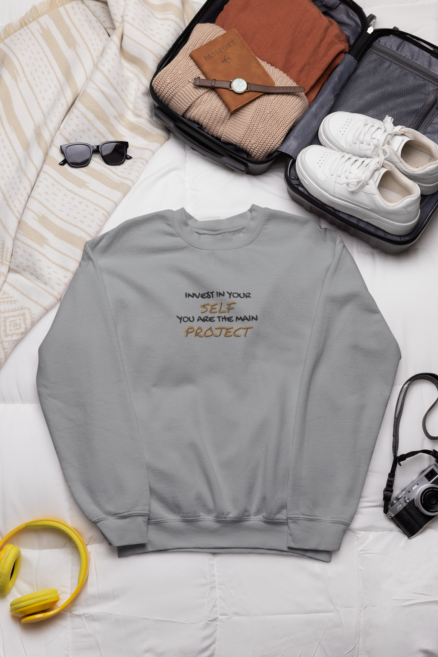 "INVEST IN YOURSELF YOU ARE THE MAIN PROJECT." Design With Gold Black Embroidered Text. Classic Unisex Crewneck Sweatshirt Premium Quality Original Clothing. Wear Your Motivation.