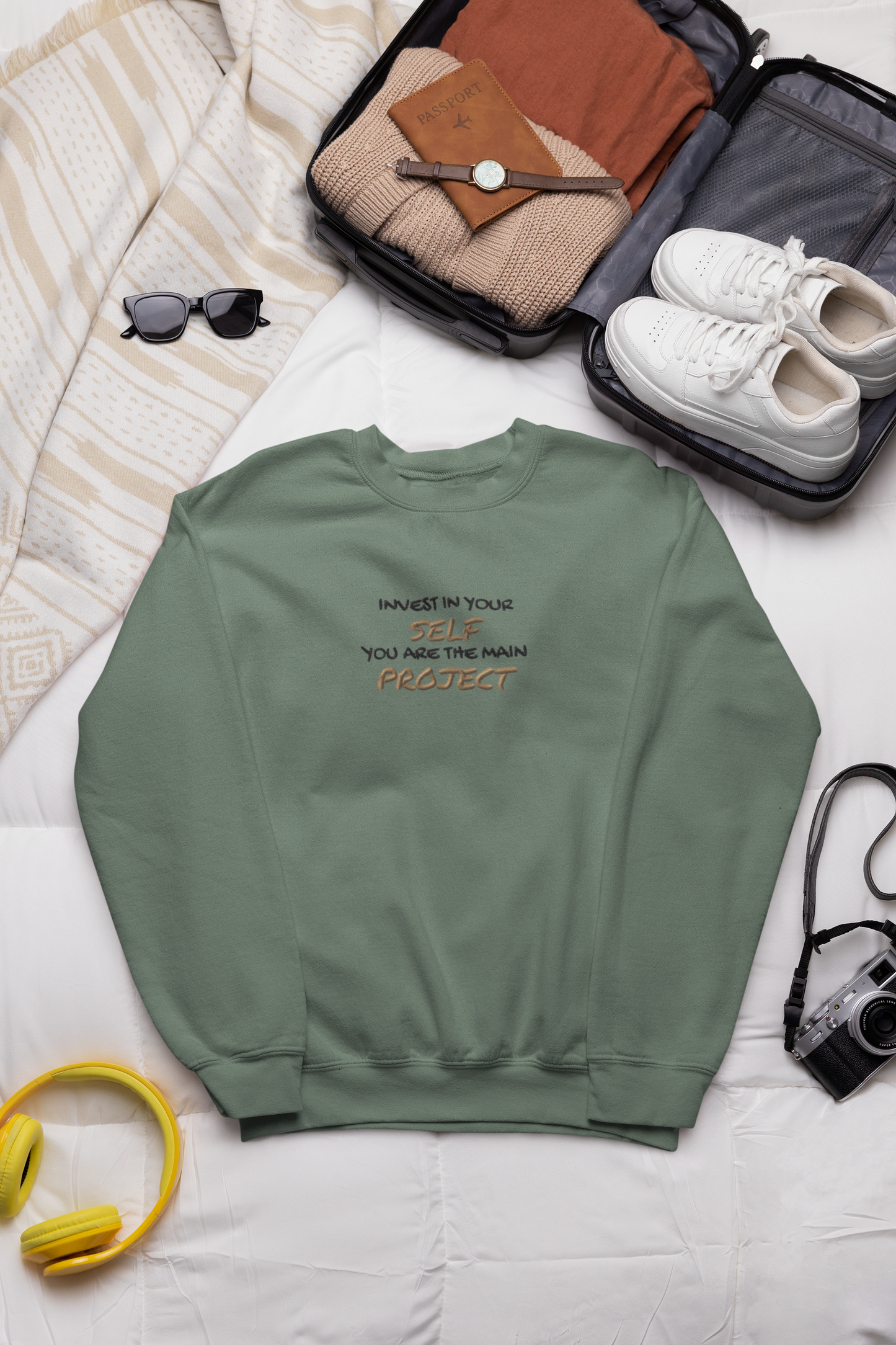 "INVEST IN YOURSELF YOU ARE THE MAIN PROJECT." Design With Gold Black Embroidered Text. Classic Unisex Crewneck Sweatshirt Premium Quality Original Clothing. Wear Your Motivation.