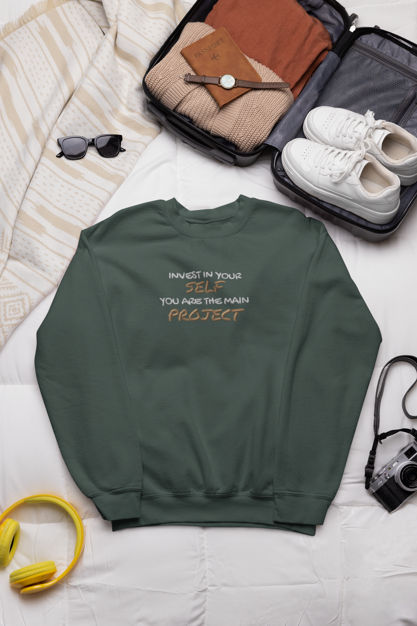 "INVEST IN YOURSELF YOU ARE THE MAIN PROJECT." Design With Gold White Embroidered Text. Classic Unisex Crewneck Sweatshirt Premium Quality Original Clothing. Wear Your Motivation.