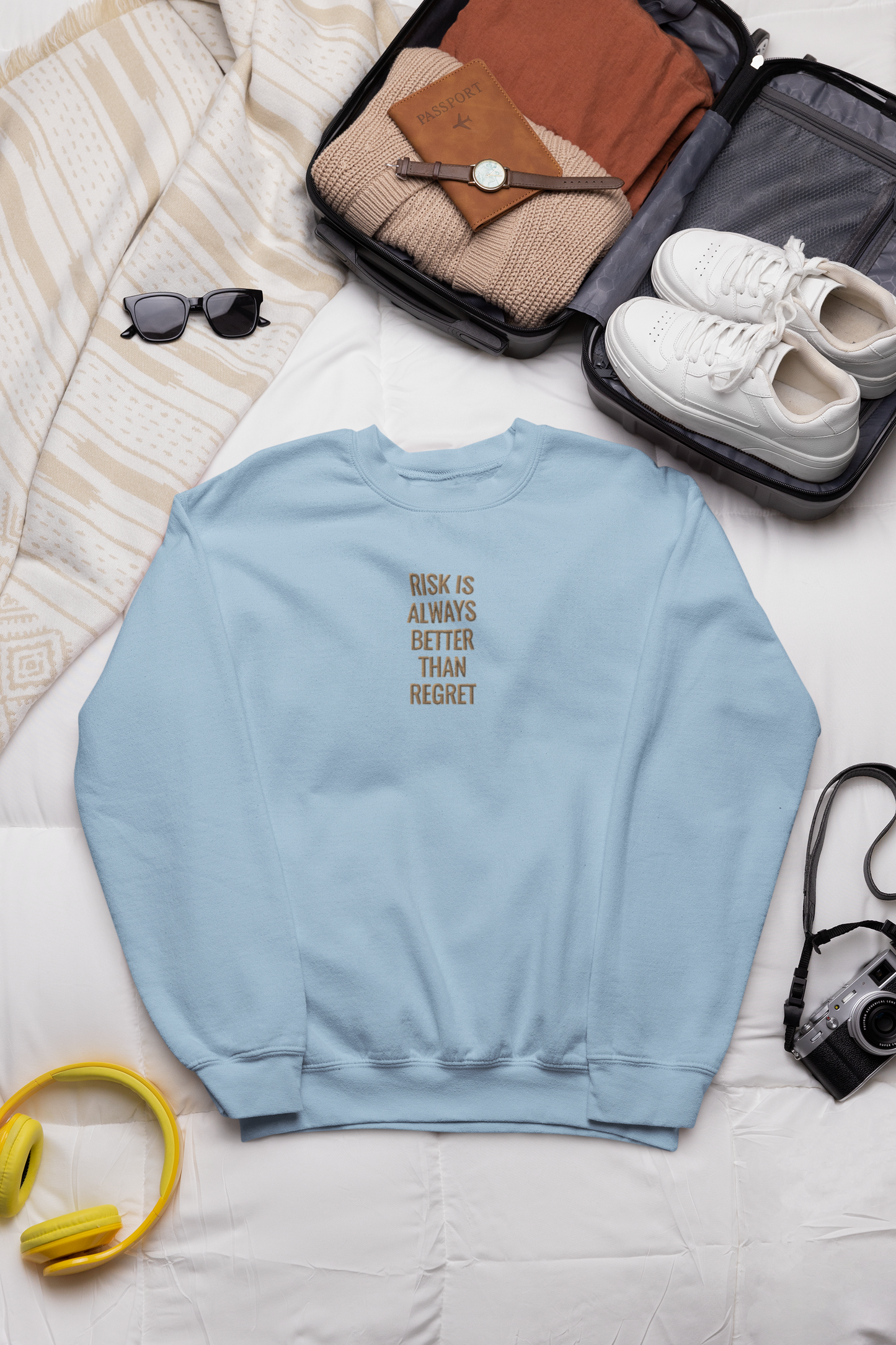 "RISK IS ALWAYS BETTER THAN REGRET" Design With Gold Embroidered Text.Classic Unisex Crewneck Sweatshirt Premium Quality Original Clothing. Wear Your Motivation.