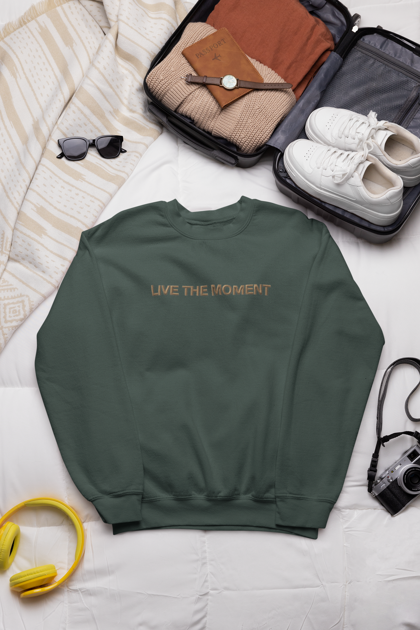 "LIVE THE MOMENT" Design With Gold Embroidered Text.Classic Unisex Crewneck Sweatshirt Premium Quality Original Clothing. Wear Your Motivation.