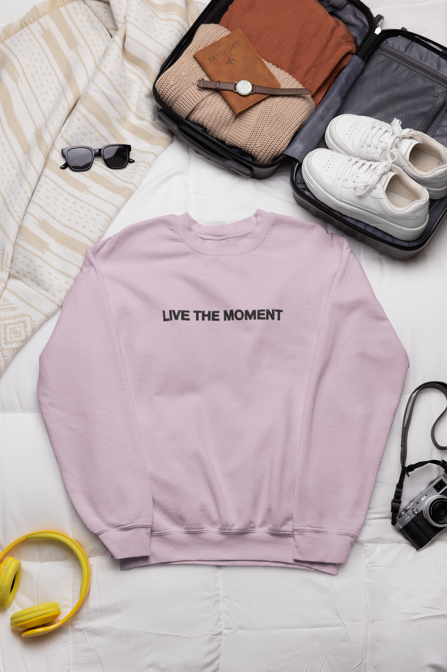 "LIVE THE MOMENT" Design With Black Embroidered Text.Classic Unisex Crewneck Sweatshirt Premium Quality Original Clothing. Wear Your Motivation.